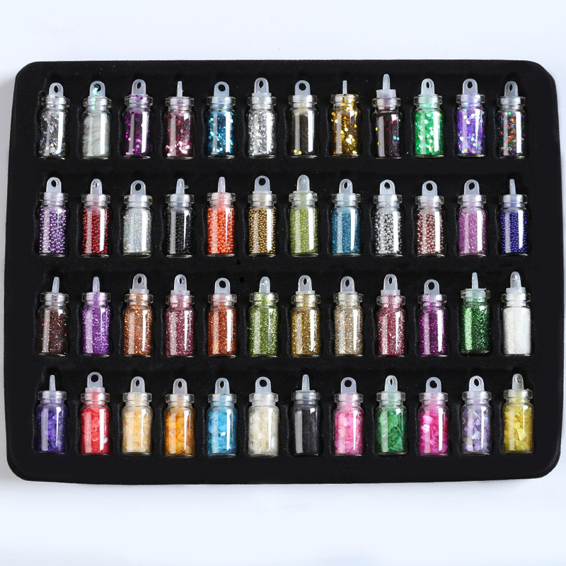 Different Design in Small Bottle Nail Art Decoration